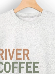 Detail of the ribbed crewneck and River Coffee print on a gray melange sweatshirt