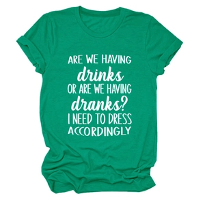 Detail of green crew neck T-shirt with white humor text print on soft cotton fabric