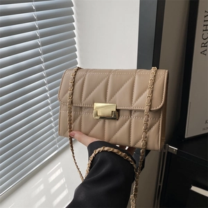 Chic beige quilted square crossbody bag with gold lock and chain strap for women