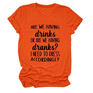 Detail view of orange cotton t-shirt with black graphic text print and round neckline