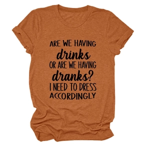 Detail of rust orange crew neck t-shirt with funny quote print and knit texture