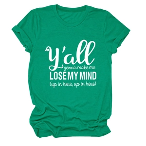 Detail of green cotton crew neck t-shirt with white artistic letter print on white background