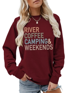 Close-up of vintage River Coffee Camping print on burgundy crewneck sweatshirt
