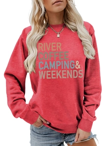 Detail of red crewneck sweatshirt featuring River Coffee Camping letter print