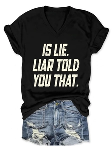 Detail of V-neck T-shirt with 'IS LIE. LIAR TOLD YOU THAT' text and ripped denim shorts