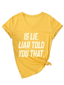 Detail of V-neck T-shirt in mustard yellow with letter print and stylish side knot