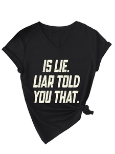 Detail of black V-neck T-shirt featuring a distressed slogan print and knotted hem design