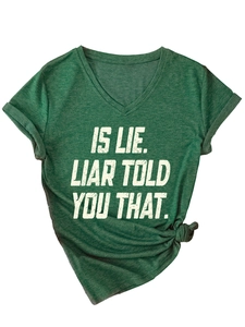 Detail of dark green V-neck T-shirt with white slogan print and side knot detail