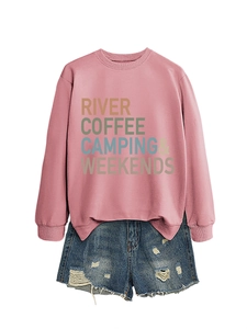 Pink crewneck sweatshirt with camping graphics and distressed blue denim shorts set