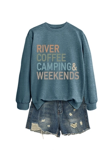 Casual two-piece set featuring a blue-grey sweatshirt and distressed denim shorts