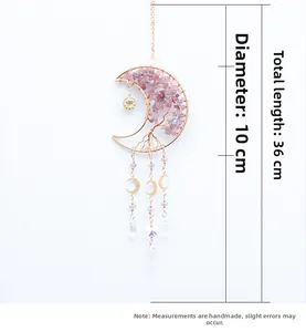 Detail of pink crystal Tree of Life moon pendant with dimensions 10cm by 36cm