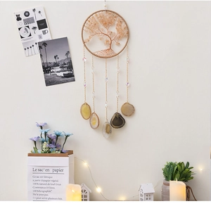 Detail of Tree of Life dream catcher with citrine stones and natural agate slices