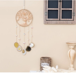 Detail of Tree of Life dream catcher with citrine stones and natural agate slices