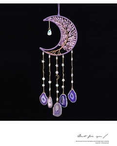 Detail of amethyst crystal tree of life moon dreamcatcher with purple agate slices
