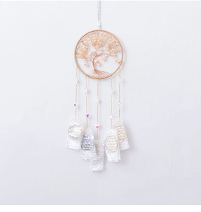 Detail of life tree dream catcher with citrine stones and crystal beads on white background