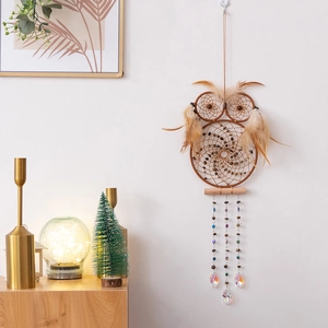Handmade owl dreamcatcher with brown feathers and iridescent crystal pendants