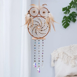 Handmade owl dreamcatcher wall hanging with yellow feathers and crystal pendants