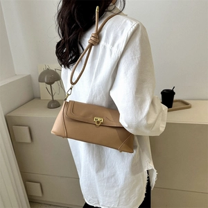 French retro khaki leather baguette shoulder bag with golden U-shaped buckle and knot strap