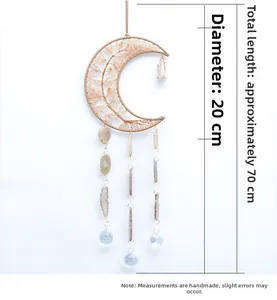 Detail view of crescent moon dream catcher with citrine stones and agate slices