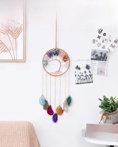 Detail of life tree wall hanging with seven chakra natural agate slices decoration