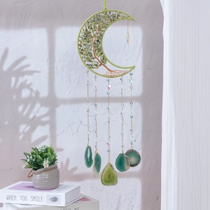 Green moon-shaped tree of life dreamcatcher with crystals and natural agate hanging