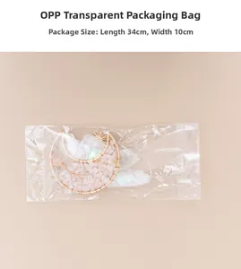 Pink crystal tree of life moon pendant in clear OPP bag with dimensions 34x10 cm