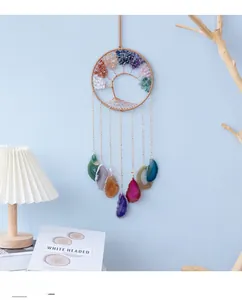 Detail of life tree wind chime with colorful natural agate slices and gemstone beads