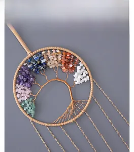 Detail of handmade Tree of Life wall hanging with natural crystals and gold chains