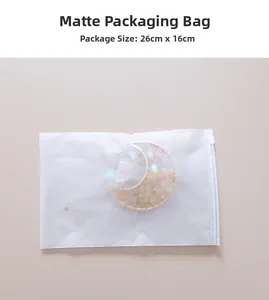 Frosted translucent 26x16cm packaging bag with zipper seal and decorative moon pendant