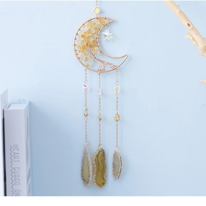 Detail of handmade Tree of Life moon pendant with citrine crystals and agate slices