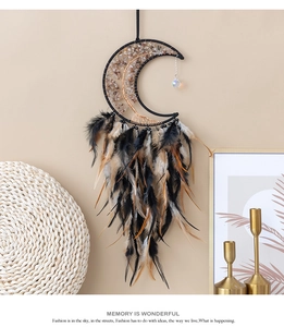 Bohemian Tree of Life dream catcher with black feathers and metal crescent moon wall decor