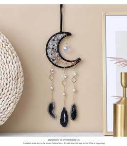 Detailed wall hanging with crescent moon frame and crystal tree of life design