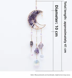 Detail of amethyst moon sun catcher with golden wire tree of life and crystal drops
