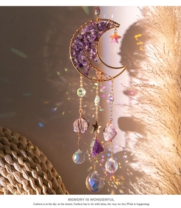 Detail of amethyst moon suncatcher tree of life design with rainbow crystal prism