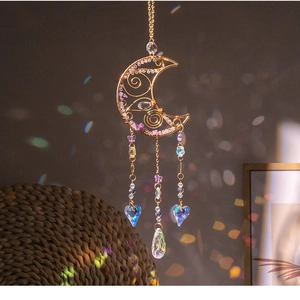Detailed moon-shaped suncatcher with purple amethyst stones and colorful crystal droplets