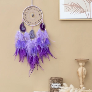 Handmade purple dreamcatcher with amethyst stones, agate slices, and soft feathers