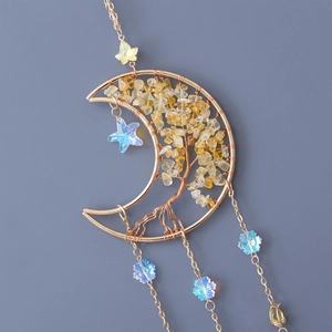 Artistic moon shaped tree of life hanging decor with yellow crystals and golden star pendants