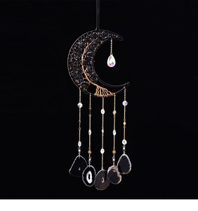 Détail de l'arbre de vie en obsidienne avec fil de cuivre et cadre en croissant de lune