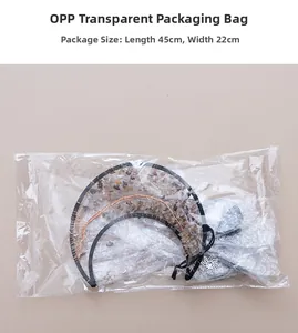 Macro detail of moon dream catcher in OPP packaging with size 45x22cm dimensions