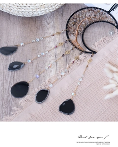 Macro detail of moon dream catcher with tree of life, crystal beads and agate slices