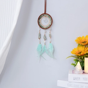 Handmade turquoise dreamcatcher with feathers and crystals for home and car decor