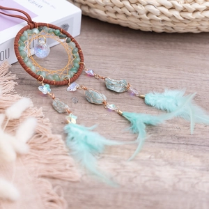 Bohemian dream catcher car hanging with turquoise stones and mint green feathers