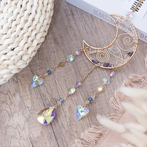 Moon-shaped suncatcher with amethyst stones and crystal butterfly accents for home decor