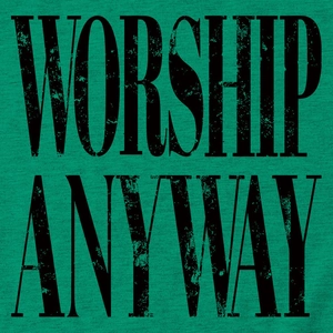 Detail view of the WORSHIP ANYWAY vintage print on green cotton t-shirt fabric texture