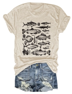 Detailed close-up of vintage fish and coral sketch print on beige cotton T-shirt