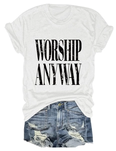 Flat lay of a white crew neck tee with Worship Anyway print and distressed denim shorts