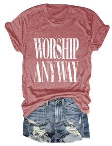 Flat lay of heather red t-shirt with Worship Anyway print and ripped denim shorts