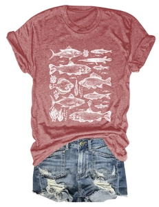 Detail of red cotton T-shirt featuring white fish and seaweed illustration prints