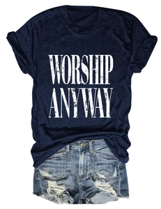 Close-up of navy blue cotton T-shirt with 'WORSHIP ANYWAY' print and denim shorts