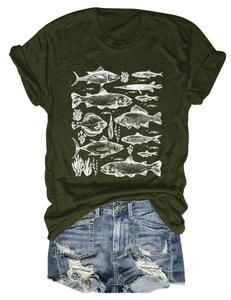 Flat lay of olive green t-shirt with fish prints and distressed denim shorts outfit